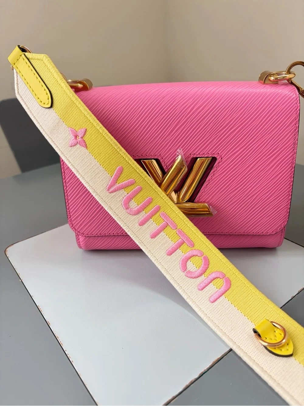 Louis Vuitton Pink Twist Compact Crossbody Bag with Gold Hardware